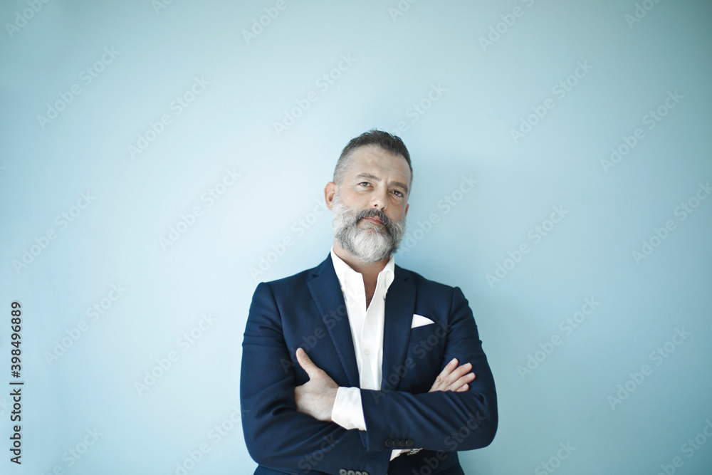 portrait of a businessman on a blue background portrait of a businessman on a blue background