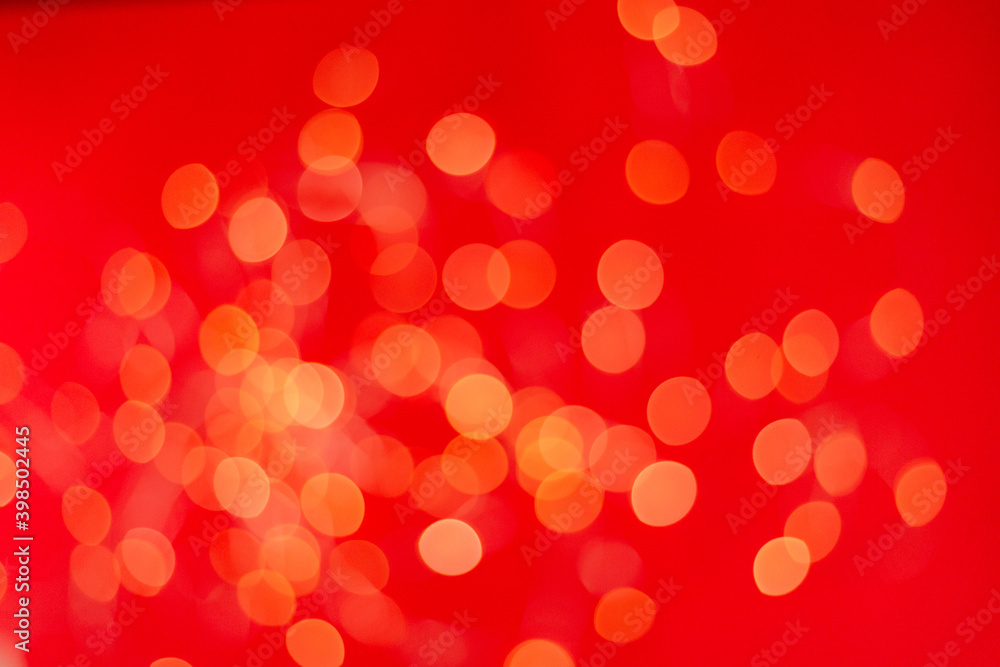 Christmas holiday background with festive bokeh on red background. Ready-to-install products. blur and bokeh. holiday blur lights. copy space. space for text Christmas holiday background with festive bokeh on red background. Ready-to-install products. blur and bokeh. holiday blur lights. copy space. space for text