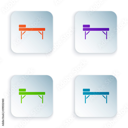 Color Massage table icon isolated on white background. Set colorful icons in square buttons. Vector.