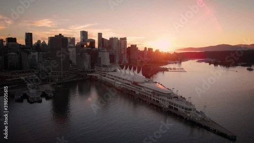 Wallpaper Mural Flying over the Vancouver city skyline at sunset. Torontodigital.ca