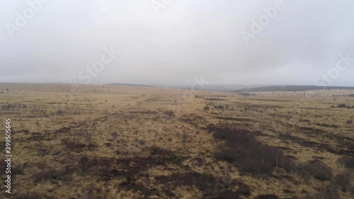 Winter in misty High Fens in Eifel Nature Park, tracking shot photo