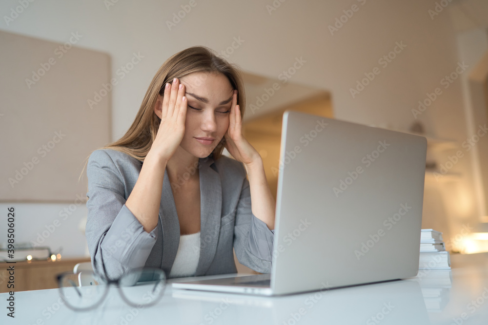 Head shot exhausted young woman taking off glasses, suffer from eyes strain due to computer overwork. Tired unhealthy millennial mixed race lady having painful feelings. High quality photo Head shot exhausted young woman taking off glasses, suffer from eyes strain due to computer overwork. Tired unhealthy millennial mixed race lady having painful feelings. High quality photo