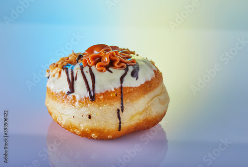 Happy Hanukkah and Hanukkah Sameach is a traditional Jewish donut with Dulce de Leche and chocolate. photo