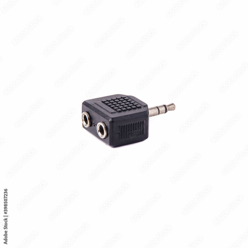Mini Jack adapter with single to double output, isolated on white background. Close up Mini Jack adapter with single to double output, isolated on white background. Close up