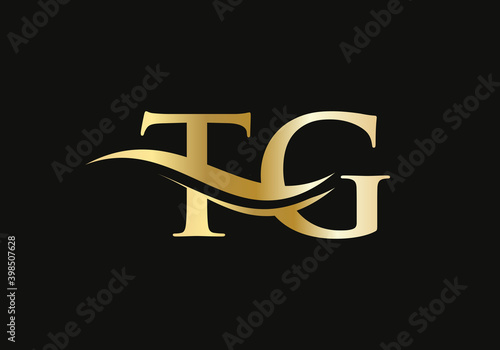 Letter TG Logo Design with water wave concept. TG letter logo design photo