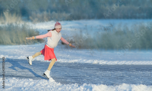 Girl on skates in winter