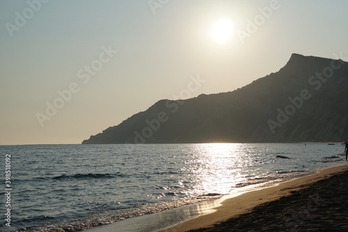 kavos, arkoudillas beach, greece, sea, mediterranean, sunset photo