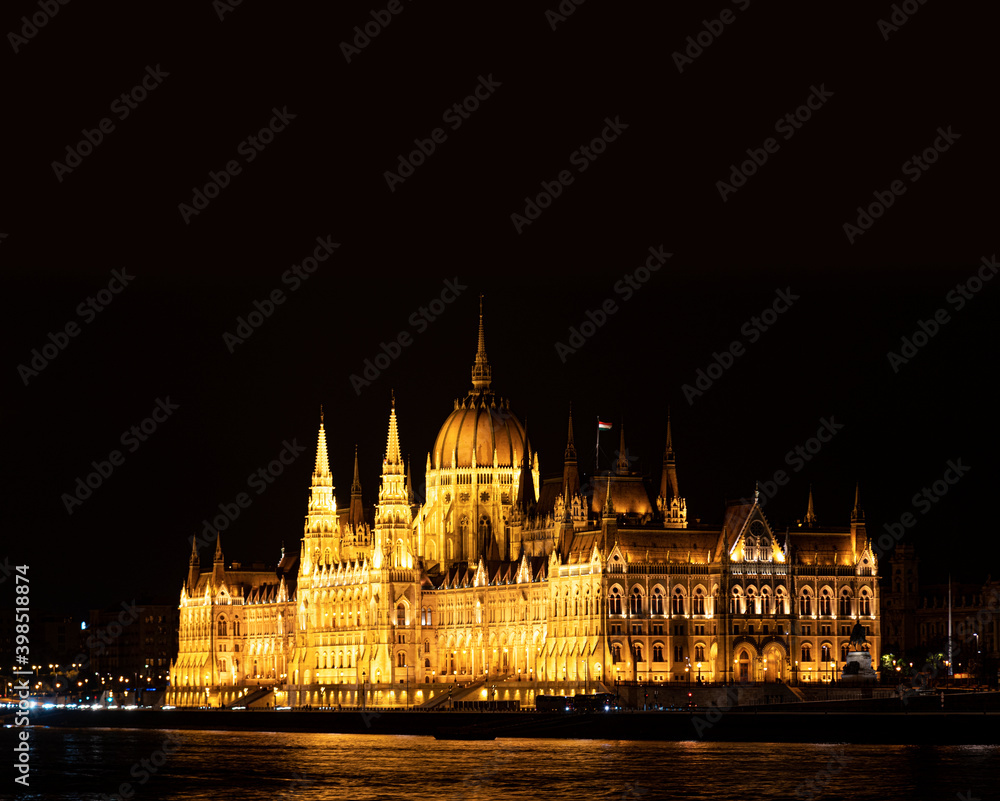 Parliament building at night in Budapest, Hungary.
