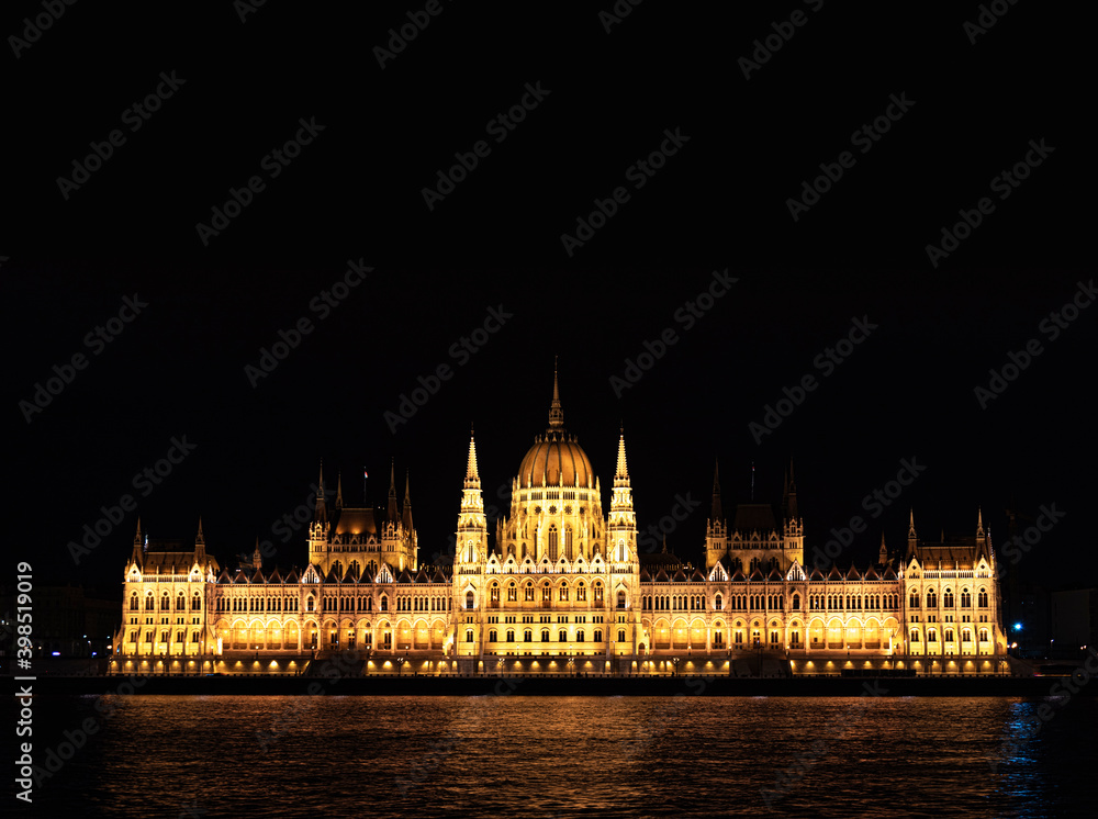 Parliament building at night in Budapest, Hungary.