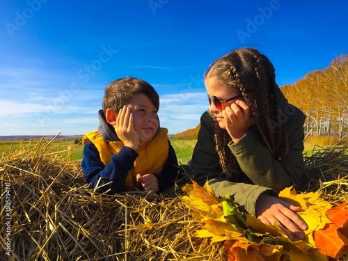 happy family children in autumn field