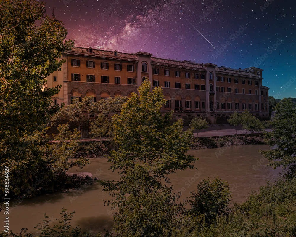 starry night sky over Rome Italy, fate bene fratelli hospital on Tiber river island, view from lungotevere de cenci    ..