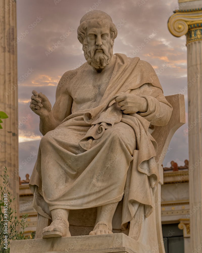 Fototapeta premium Plato the ancient Greek philosopher statue under dramatic sky, Athens Greece