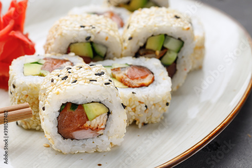 Japanese sushi roll on plate close up