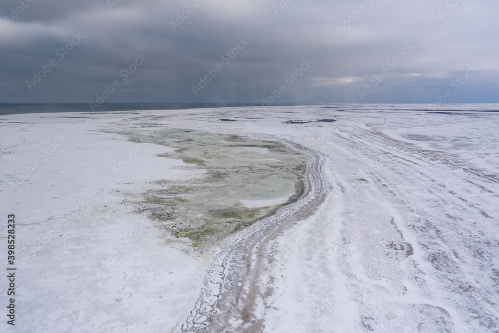 Textured background view of arctic ocean in northern Manitoba, Canada, before the ie has fully frozen for the winter on Hudson Bay.