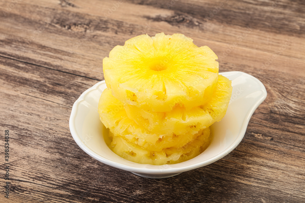 Sweet pineapple rings in the bowl Sweet pineapple rings in the bowl