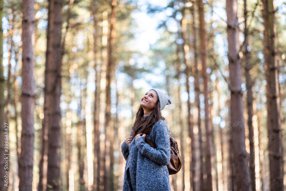 Smiling female hiker exploring in Cannock Chase woodland Smiling female hiker exploring in Cannock Chase woodland