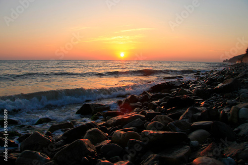 Subtropical sunset over sea. Tha Black sea seashore © scullery