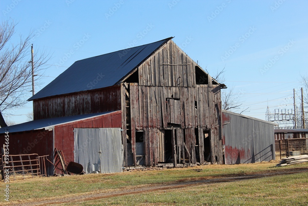 Old farm barn  with many boards missing