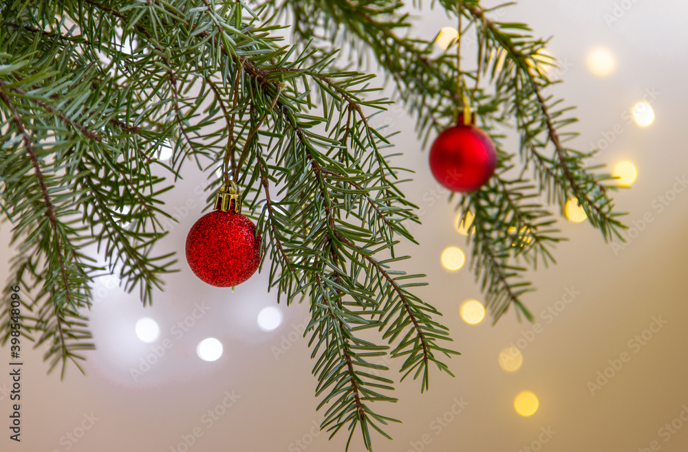 Christmas tree branches and red balls on bokeh background. Christmas, winter, new year composition Christmas tree branches and red balls on bokeh background. Christmas, winter, new year composition