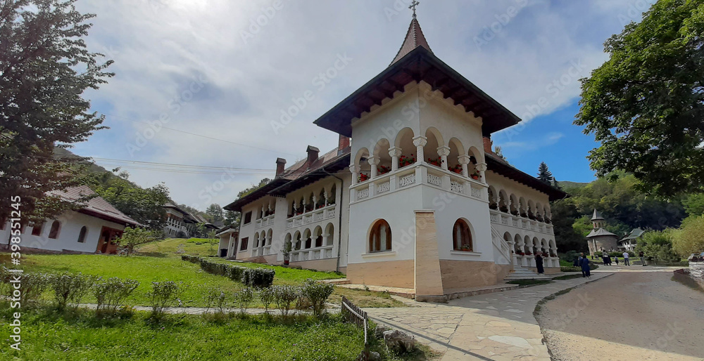 View of a Brancovenesc style palace build with balcony and windows with circular arches. Building in Romanian Renaissance style.