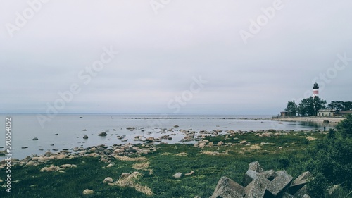 lighthouse by the bay beautiful view around the sandy beach