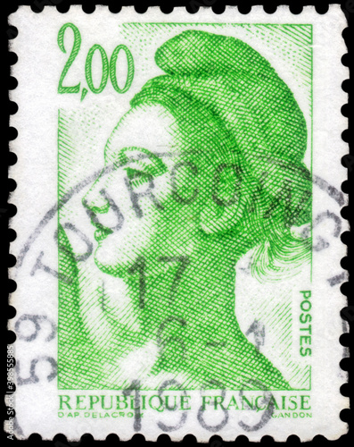 Postage stamp issued in the France with the image of the Liberty. From the series on Liberte de Gandon, 1987 photo
