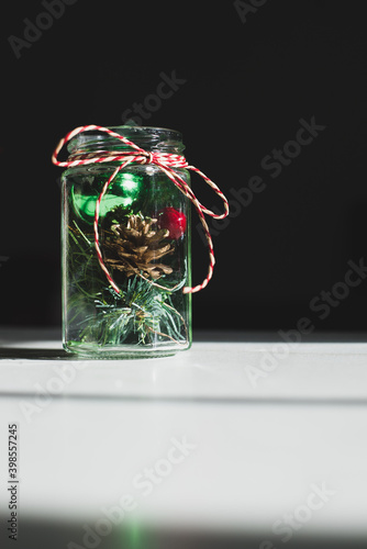 Christmas decorations in a jar with ribbon