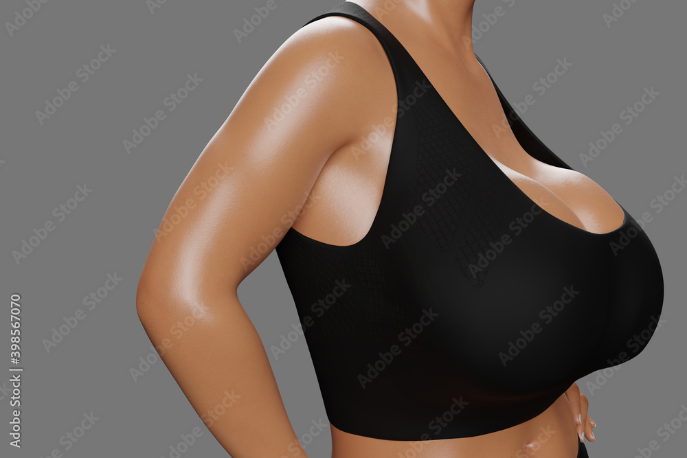 Young slim woman with big breasts in black sportswear Stock