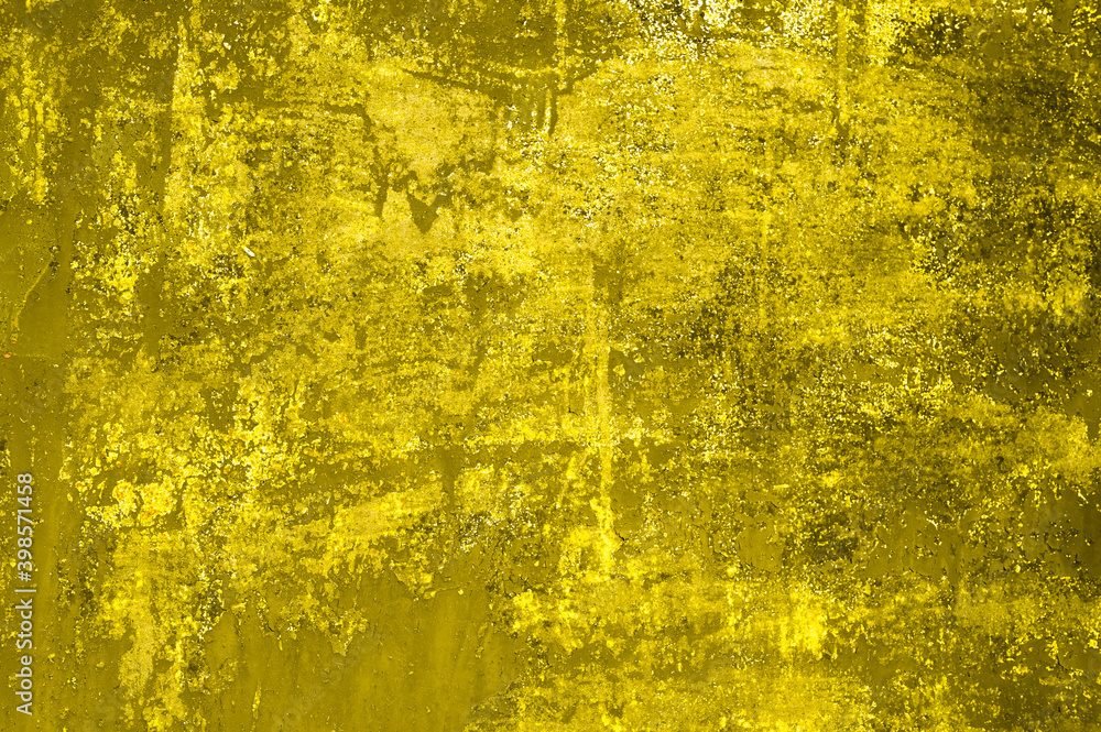 Metallic surface scratched and stained. Tinted in color 2021 illuminating yellow