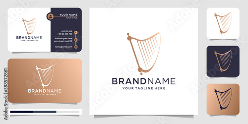 harp logo design with business card vector illustration. icon for music ,classical,instrument,elegant,luxury ,brand. premium vector