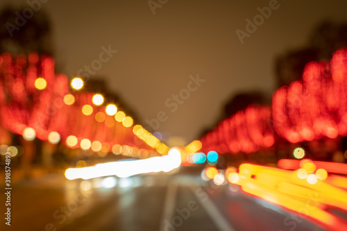 Paris,France - 12 09 2020: Blurred view of the Avenue des Champs Elysées with Christmas lights © Franck Legros