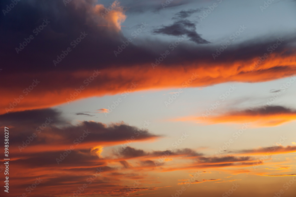 Beautiful vibrant sunset sky: orange and dark blue