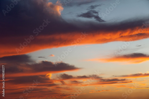 Beautiful vibrant sunset sky: orange and dark blue © Freelancer