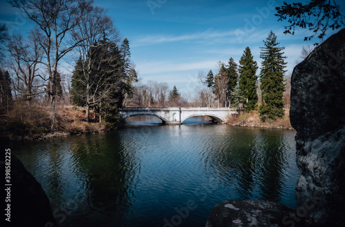 Fototapeta Naklejka Na Ścianę i Meble -  reflection of trees in water bridge