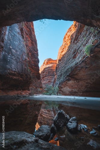 a view of a canyon through a cave