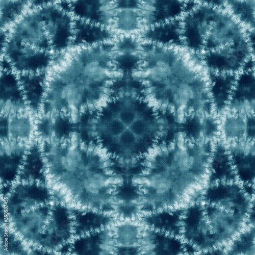 Tie dye seamless tile pattern. Watercolor pattern design on subtle white fabric texture.