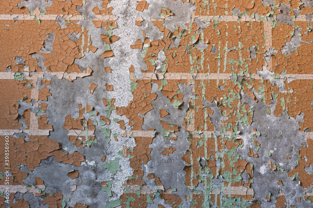 Peeling paint on the wall. Old concrete wall with cracked flaking paint. Weathered rough painted surface with patterns of cracks and peeling. High resolution texture for background and design. Closeup Peeling paint on the wall. Old concrete wall with cracked flaking paint. Weathered rough painted surface with patterns of cracks and peeling. High resolution texture for background and design. Closeup