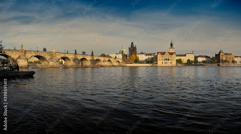 .stone old Charles bridge u from 1402 and vltava river in the center of prague at sunset in czech republic