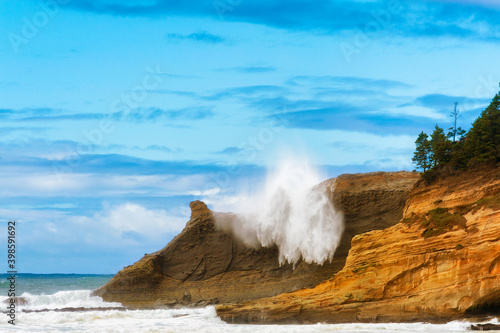 Cape Kiwanda sneaker wave hits cliffs photo