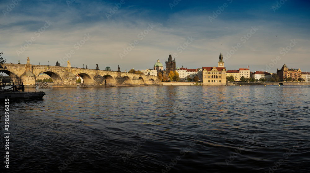 .stone old Charles bridge u from 1402 and vltava river in the center of prague at sunset in czech republic