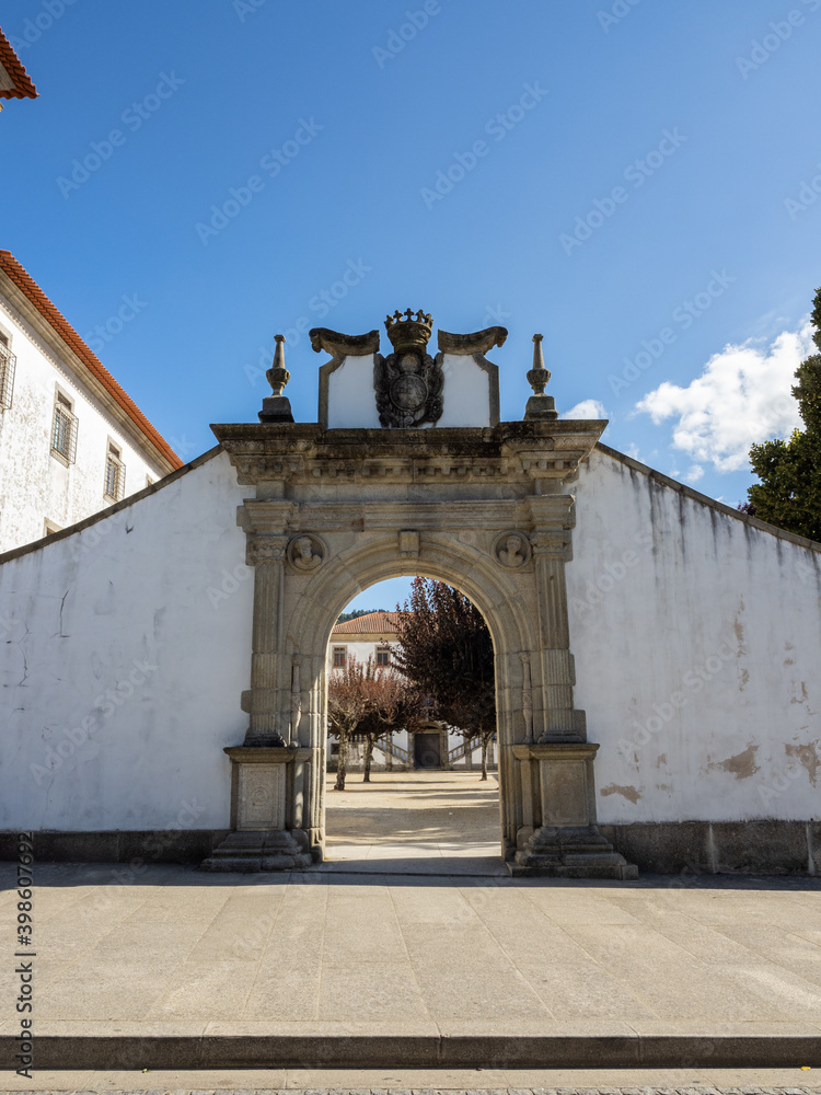 Fototapeta premium Entrance portico to the largo Santa Mafalda by the Arouca Monastery, the largest granite construction of its kind in Portugal. Arouca, Portugal.