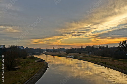 Beautiful landscape with the Warta river by sunset in Poznan, Poland