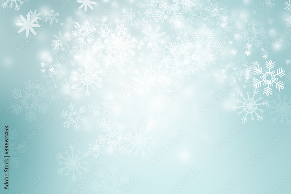White Xmas Bokeh blur background. Circle light on blue backdrop. Snowflake abstract light wallpaper.