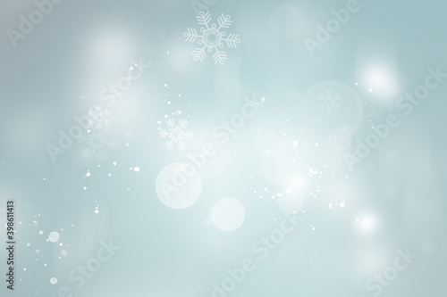 white and gray snow blur abstract background. Snowflake Bokeh Christmas blurred beautiful shiny Christmas lights.
