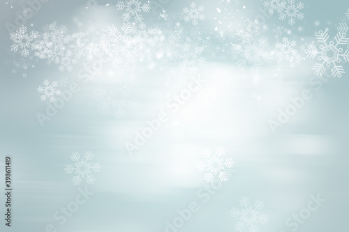 white and gray snow blur abstract background. Snowflake Bokeh Christmas blurred beautiful shiny Christmas lights. © ooddysmile