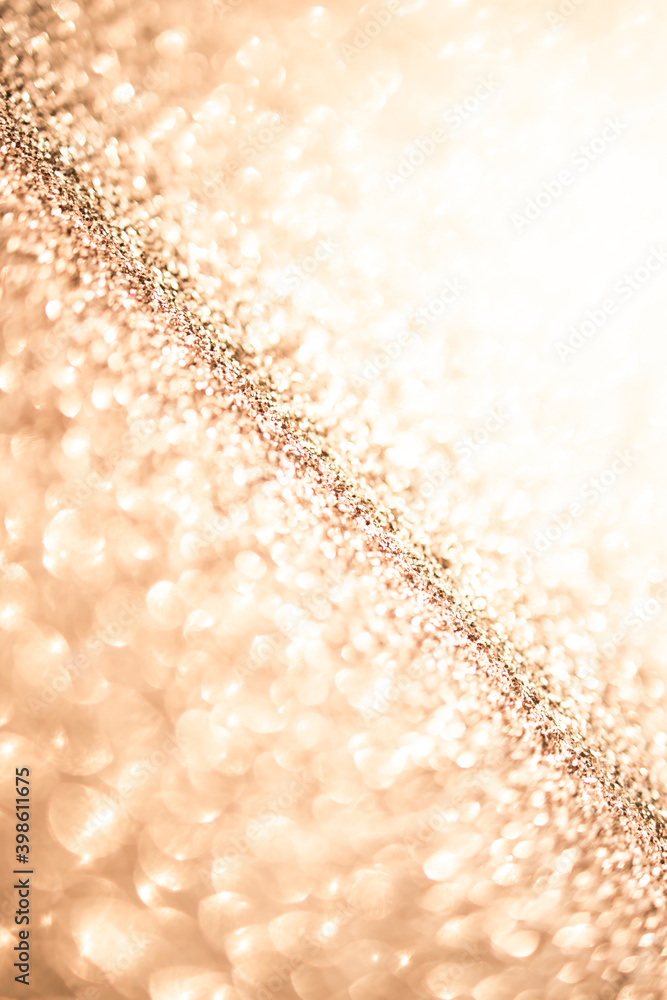 Golden blur abstract background. Yellow Bokeh Christmas blurred beautiful shiny Christmas lights. Golden blur abstract background. Yellow Bokeh Christmas blurred beautiful shiny Christmas lights.