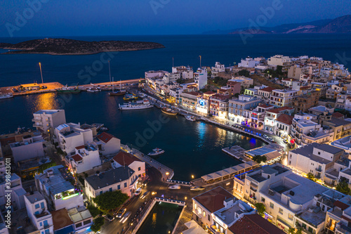 Night twilight panoramic view of Agios Nikolaos, Crete island, Greece