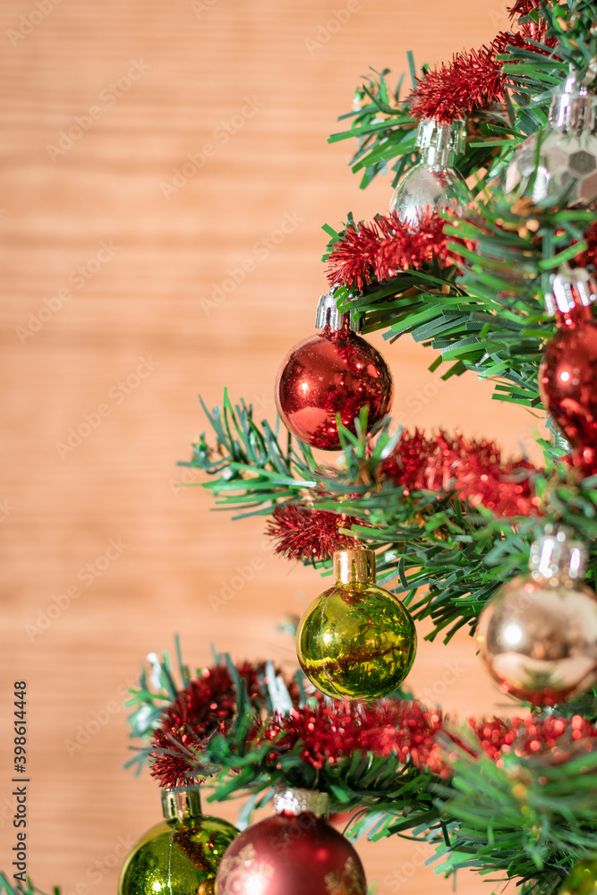Christmas tree and wooden background