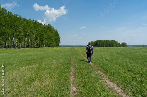 A man walks on a rural road © Ernest Vursta