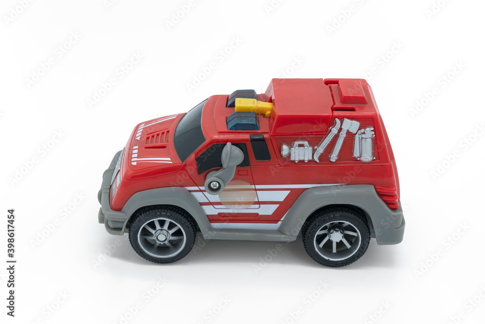 Novosibirsk, Russian Federation, April 05, 2020: children's toy fire truck, close-up on a white background Novosibirsk, Russian Federation, April 05, 2020: children's toy fire truck, close-up on a white background